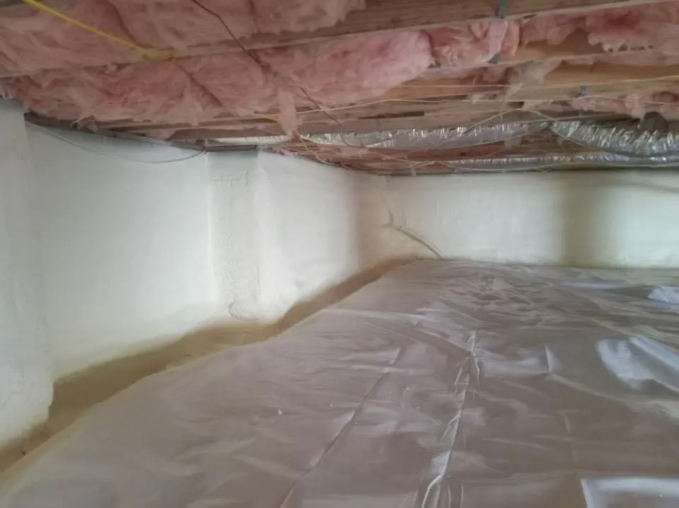Crawl space encapsulation with closed-cell spray foam for Commercial Roof Restoration in Mansfield